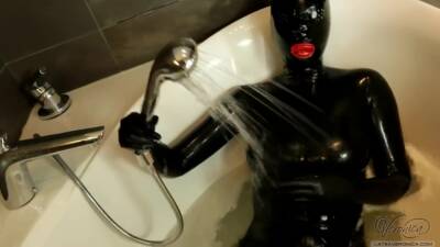 Sexy Black Rubberdoll In Bath on youpornvideos.one