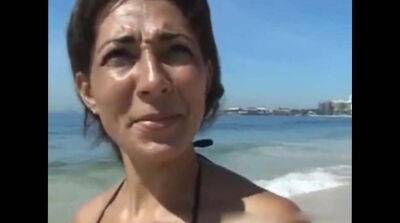 Tanned cougar was picked up on a public beach for kinky sex and a facial - Germany - Brazil on youpornvideos.one