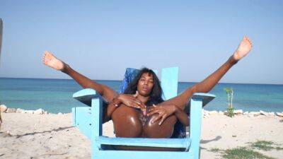 Ebony Latin Girl, Oil Skin And Public Orgasm On The Beach on youpornvideos.one