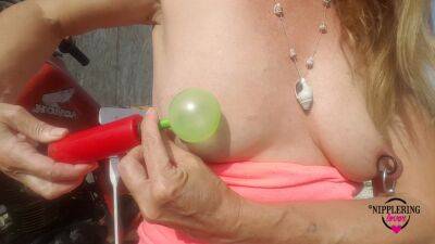 Nippleringlover Horny Milf Sticking Balloons Through Extreme Stretched Pierced Nipples Outdoors on youpornvideos.one