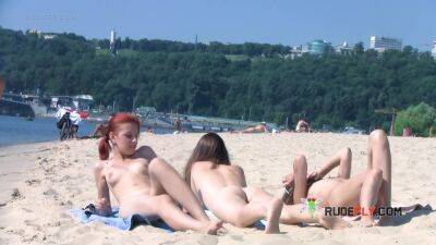 Wicked young nudist enjoys being topless at the beach on youpornvideos.one