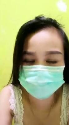 Playful Indonesian hottie wears a facemask while rubbing - Indonesia on youpornvideos.one