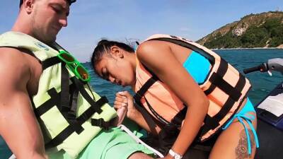 Thai teen giving blowjob on a jet ski - Thailand on youpornvideos.one