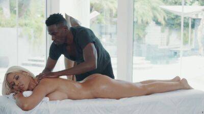 African masseur fucks his big tits bimbo client on the table on youpornvideos.one