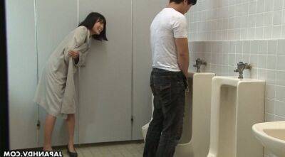 Crazy Asian chick Uta Kohaku pisses on dick of one stranger dude in a public toilet on youpornvideos.one