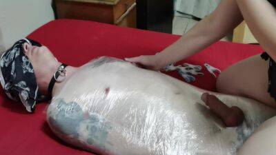 Mistress Wraps Her Slave In Clingwrap on youpornvideos.one