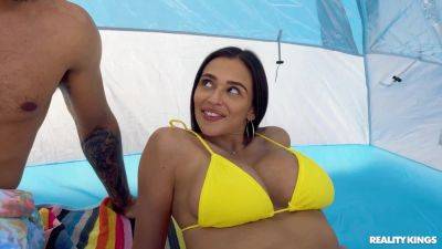 Dark-haired beauty in a yellow bikini takes good care of BBC on youpornvideos.one