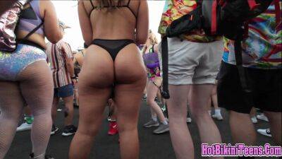 Phat ass Latina raver girl shaking her big ass cheeks at rave festival on youpornvideos.one