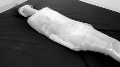 Mummified in plastic wrap girl gets fucked and squirts after fingering on youpornvideos.one