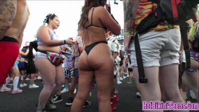 Phat ass Latina raver girl shaking her big ass cheeks at rave festival on youpornvideos.one