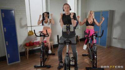 Sporty bitches get intimate during spinning class and devour the same cock together on youpornvideos.one