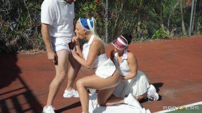 Sporty females take turns when sharing dick on the tennis court on youpornvideos.one