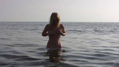 Divine Blonde Teen Blissfully Naked in the Sea on youpornvideos.one