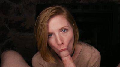 Freckled redhead throats the big dick and lets it explode on her face on youpornvideos.one