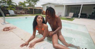 Aroused ebony goes very loud during outdoor pool porno with her new BF on youpornvideos.one