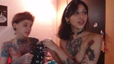 Two girls with tattoos show what they can do with hot pussy on youpornvideos.one