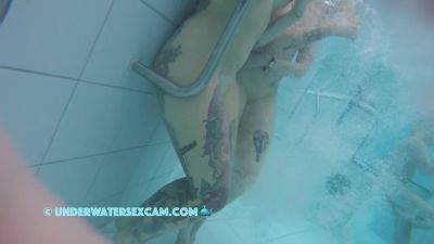 In This Underwater Video We See A Lot Of Piercings And Tattoos on youpornvideos.one