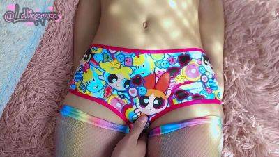 Petite 18-year-old girlfriend, Lolliepopxxxx, excitedly shows off her favorite cartoon character panties on youpornvideos.one